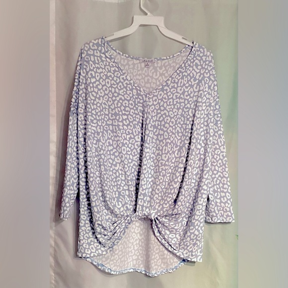 Women’s light weight polyester blouse, soft blue with white animal print design. - Picture 1 of 4